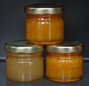 Our taster range of infused honeys containing home-made crystallised ginger and turmeric